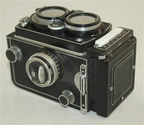 A Rolleiflex 3.5 Planar Xenotar camera and instruction book